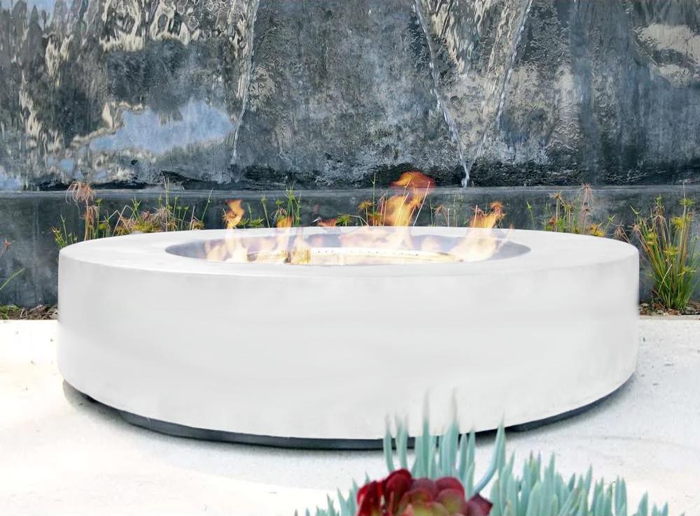 white cylinder fire pit